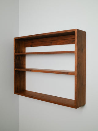 Monolith Wall Shelf in walnut, side view showing three solid hardwood tiers