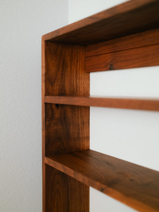 Monolith Wall Shelf in walnut, detail of solid hardwood grain and rounded edges