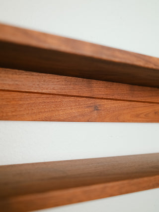 Monolith Wall Shelf in walnut, close-up of french cleat mounting detail