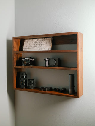 Monolith Wall Shelf in walnut, full three-tier display mounted on a wall